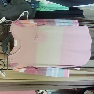 BE Stage long sleeve, lightweight pink crew neck sweater with breast pocket.